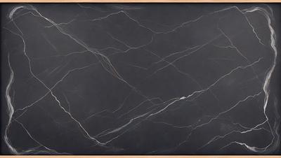 The primary subject of the image is a black marble countertop. The setting is a kitchen, with the countertop being the main focus of the scene. The visual style is a close-up of the marble countertop, showcasing its texture and pattern. The colors and mood of the image are dark and moody, with the black marble countertop being the dominant color.