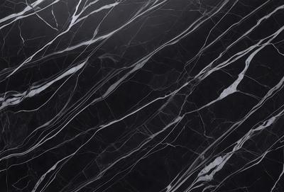 The primary subject of the image is a marble countertop with a black and white pattern. The setting is a kitchen, and the visual style is a close-up of the marble countertop. The colors and mood of the image are predominantly black and white, giving it a classic and elegant appearance.