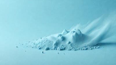 The primary subject of the image is a pile of white powder, which appears to be a mountain of sugar. The setting is a white background, which provides a clean and uncluttered environment for the scene. The visual style of the image is a photo, capturing the details and texture of the sugar mountain. The colors and mood of the image are predominantly white, giving it a clean and pristine appearance.