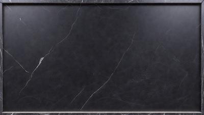 The primary subject of the image is a black marble countertop. The setting is a kitchen, with the countertop being the main focus of the scene. The visual style is a photo, capturing the marble countertop in detail. The colors and mood of the image are dark and moody, with the black marble countertop being the dominant color.