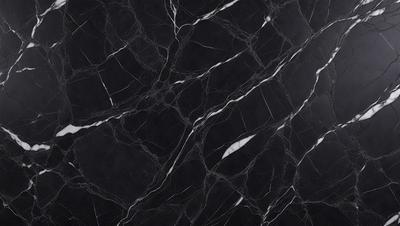 The primary subject of the image is a black marble countertop with a white vein running through it. The setting is a kitchen, and the visual style is a close-up of the marble countertop. The colors and mood of the image are predominantly black and white, giving it a classic and elegant appearance.