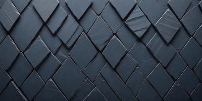 The primary subject of the image is a blue tile wall with a pattern of black and grey tiles. The setting is a room with a blue background, and the visual style is a close-up of the tile wall. The dominant colors are blue and grey, creating a calm and soothing atmosphere.