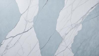 The primary subject of the image is a marble wall with a blue tint. The setting is a bathroom, and the visual style is a photo. The dominant colors are blue and white, creating a calm and soothing atmosphere.