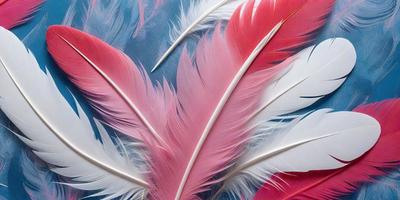 The primary subject of the image is a close-up of a pink and white feather. The feather is displayed against a blue background, giving it a vibrant and eye-catching appearance. The visual style of the image is a combination of photo and digital art, creating a unique and artistic representation of the feather. The dominant colors in the image are pink and white, which evoke a sense of warmth and elegance.