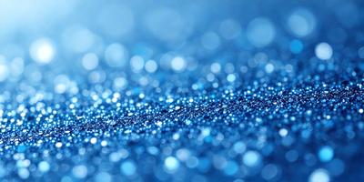 The primary subject of the image is a blue background with a pattern of blue and white dots. The setting is a dark blue surface, and the visual style appears to be a digital art or illustration. The colors and mood of the image are predominantly dark blue and white, creating a calm and serene atmosphere.
