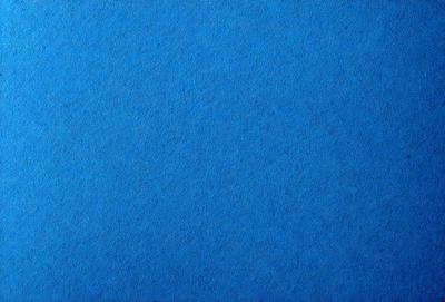The primary subject of the image is a blue background. The setting is a blue sky, and the visual style is a photo. The colors and mood of the image are predominantly blue, creating a calm and serene atmosphere.