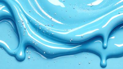 The primary subject of the image is a blue liquid, possibly a frosting or a paint, with a swirling pattern. The setting is a white surface, possibly a table or a canvas, where the blue liquid is being applied. The visual style appears to be a combination of a photo and a digital art, as the blue liquid has a swirling pattern that gives it a more artistic and creative appearance. The colors and mood of the image are predominantly blue, creating a calm and soothing atmosphere.