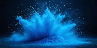The primary subject of the image is a blue powder or substance, which appears to be a powdered substance or a blue liquid. The setting is a dark background, which contrasts with the blue substance. The visual style is a close-up of the blue substance, showcasing its texture and color. The colors and mood of the image are predominantly blue, creating a sense of depth and intensity.
