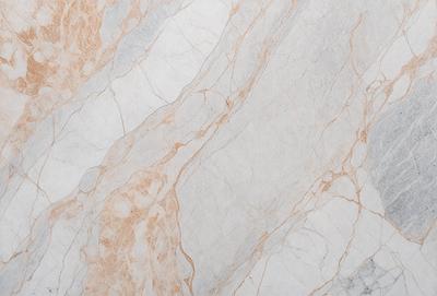 The primary subject of the image is a marble wall with a pink and white color scheme. The setting is a room with a white and pink marble wall, which serves as the background. The visual style is a close-up of the marble wall, showcasing its texture and patterns. The colors and mood of the image are warm and inviting, with the pink and white hues creating a sense of elegance and sophistication.