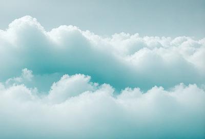The primary subject of the image is a cloudy sky with a blue hue. The setting is a vast, open space with no visible landmarks or objects. The visual style is a natural, outdoor scene with a focus on the clouds. The colors and mood of the image are serene and peaceful, with the blue sky and clouds creating a calming atmosphere.