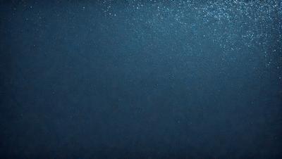 The primary subject of the image is a large body of water, which appears to be a deep blue ocean. The setting is a vast expanse of water, with no visible land or other objects. The visual style of the image is a close-up of the water, showcasing its depth and beauty. The colors and mood of the image are predominantly blue, creating a serene and tranquil atmosphere.