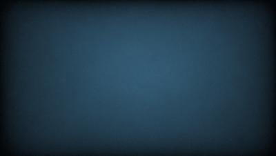 The primary subject of the image is a blue sky. The setting is a dark blue background, which creates a contrasting effect with the blue sky. The visual style is a photo, capturing the natural beauty of the sky. The colors and mood of the image are predominantly dark and moody, with the blue sky serving as the main focal point.