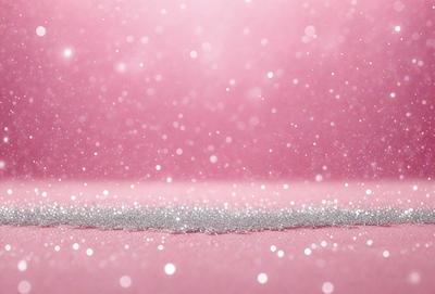 The primary subject of the image is a pink background with glittery, sparkling particles on it. The setting appears to be a pink surface, possibly a table or a wall. The visual style of the image is a close-up of the pink background with the glittery particles, creating a visually appealing and eye-catching scene. The colors and mood of the image are predominantly pink, with the glittery particles adding a touch of sparkle and excitement to the overall atmosphere.