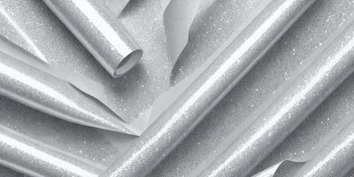 The primary subject of the image is a close-up of a silver tube, which is the main object in the scene. The setting is a white background, and the visual style is a photo. The colors in the image are predominantly silver, giving it a metallic and shiny appearance. The overall atmosphere is clean and modern, with the silver tube being the focal point of the image.
