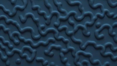 The primary subject of the image is a blue surface with a pattern of swirls and curves. The setting appears to be a blue background, and the visual style is a close-up of the blue surface. The colors and mood of the image are predominantly blue, creating a calm and serene atmosphere.