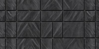 The primary subject of the image is a black tile wall. The setting is a black tile wall with a pattern of black and white tiles. The visual style is a close-up of the black tile wall. The colors and mood of the image are predominantly black and white, giving it a modern and sleek appearance.