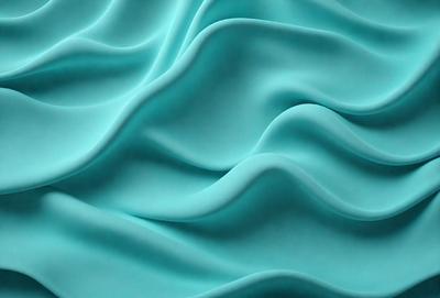 The primary subject of the image is a blue fabric, which appears to be a piece of cloth or a curtain. The setting is a close-up view of the fabric, showcasing its texture and color. The visual style is a realistic representation of the fabric, with no indication of it being a photo, digital art, illustration, drawing, pattern, texture, or clipart. The dominant colors are blue and turquoise, creating a calm and soothing atmosphere.
