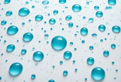 The primary subject of the image is a close-up of a blue and white pattern, which appears to be a water drop or a blue and white patterned surface. The setting is a white background, which provides a clean and minimalistic look to the image. The visual style is a close-up, which emphasizes the details of the blue and white pattern. The colors and mood of the image are predominantly blue and white, creating a calm and serene atmosphere.