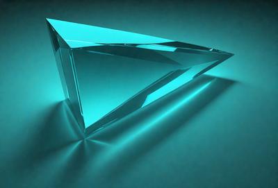 The primary subject of the image is a blue crystal or glass triangle. The setting is a blue background, which creates a striking contrast with the blue triangle. The visual style is a close-up of the triangle, showcasing its unique shape and color. The colors and mood of the image are predominantly blue, giving it a calm and serene atmosphere.