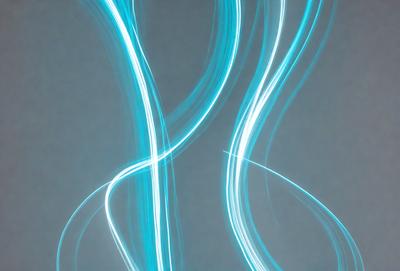 The primary subject of the image is a blue light, which appears to be a light source or a reflection of light. The setting is a gray background, which provides a neutral and unobtrusive environment for the light to stand out. The visual style of the image is a combination of digital art and photography, creating a unique and artistic representation of the light. The colors and mood of the image are predominantly blue, which gives the scene a calm and serene atmosphere.