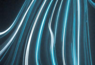The primary subject of the image is a blue light, which appears to be a light source or a reflection of light. The setting is a dark background, which contrasts with the blue light. The visual style of the image is a close-up of the blue light, showcasing its unique color and texture. The colors and mood of the image are predominantly blue, creating a serene and calming atmosphere.