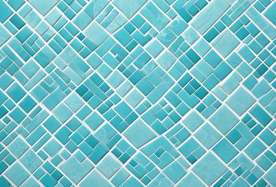 The primary subject of the image is a blue and white tile wall. The setting is a bathroom, as indicated by the blue and white tiles. The visual style is a close-up of the tiles, showcasing their intricate design. The dominant colors are blue and white, creating a clean and calming atmosphere.