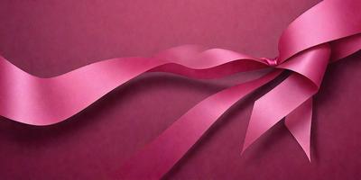 The primary subject of the image is a pink ribbon. The ribbon is wavy and appears to be made of fabric. The setting is a pink background, which complements the color of the ribbon. The visual style of the image is a close-up of the pink ribbon, showcasing its texture and details. The colors and mood of the image are predominantly pink, creating a warm and inviting atmosphere.