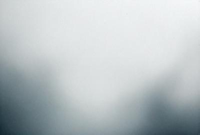 The primary subject of the image is a cloudy sky. The setting is a white background, which creates a contrast with the cloudy sky. The visual style is a photo, capturing the natural beauty of the cloudy sky. The colors and mood of the image are predominantly gray and moody, reflecting the cloudy weather.