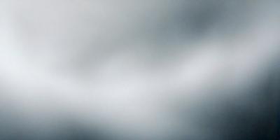 The primary subject of the image is a cloudy sky. The setting is a cloudy day, and the visual style is a photo. The colors and mood of the image are predominantly gray and moody, with the cloudy sky creating a dramatic atmosphere.