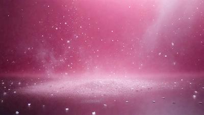 The primary subject of the image is a pink background with a dusting of white powder, giving it a slightly dirty appearance. The setting is a pink room, and the visual style is a photo. The dominant colors are pink and white, creating a warm and inviting atmosphere.