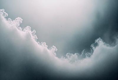 The primary subject of the image is a cloudy sky with a few wispy clouds. The setting is a dark, cloudy day, and the visual style is a photo. The colors and mood of the image are dark and moody, with the clouds creating a dramatic atmosphere.