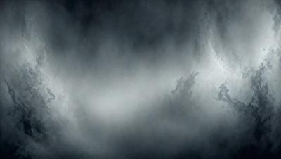 The primary subject of the image is a cloudy sky. The setting is a dark, cloudy environment, with the sky being the main focus of the image. The visual style is a photo, capturing the cloudy atmosphere. The colors and mood of the image are dark and moody, with the clouds creating a dramatic and ominous atmosphere.