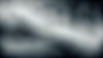 The primary subject of the image is a cloudy sky. The setting is a dark, cloudy environment, which creates a moody atmosphere. The visual style is a black and white photo, giving it a classic and timeless appearance.