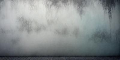 The primary subject of the image is a wall with a white surface. The setting is a room with a wooden floor. The visual style is a photo, and the dominant colors are white and gray. The overall atmosphere is calm and minimalistic.