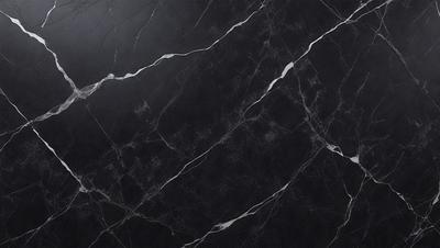 The primary subject of the image is a black marble countertop. The setting is a kitchen, with the countertop being the main focus of the scene. The visual style is a close-up of the marble countertop, showcasing its texture and pattern. The colors and mood of the image are predominantly dark, with the black marble countertop being the main source of contrast.