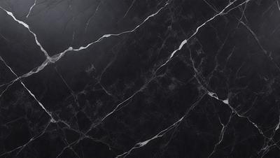 The primary subject of the image is a black marble countertop. The setting is a kitchen, with the countertop being the main focus of the scene. The visual style is a close-up of the marble countertop, showcasing its texture and pattern. The colors and mood of the image are predominantly dark, with the black marble countertop being the main source of contrast.