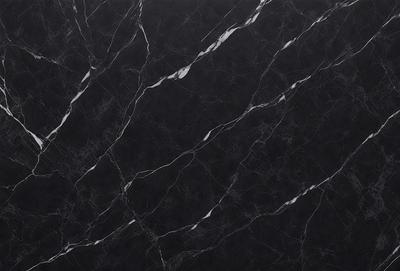 The primary subject of the image is a marble countertop with a black and white pattern. The setting is a kitchen, and the visual style is a close-up of the marble countertop. The colors and mood of the image are predominantly black and white, giving it a classic and elegant appearance.