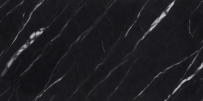 The primary subject of the image is a black marble countertop. The setting is a kitchen, with the countertop being the main focus of the scene. The visual style is a close-up of the marble countertop, showcasing its texture and pattern. The colors and mood of the image are predominantly dark, with the black marble providing a striking contrast against the surrounding environment.