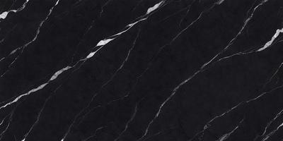 The primary subject of the image is a black marble countertop. The setting is a kitchen, with the countertop being the main focus of the scene. The visual style is a close-up of the marble countertop, showcasing its texture and pattern. The colors and mood of the image are predominantly dark, with the black marble countertop being the main source of contrast.