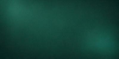The primary subject of the image is a large, dark green wall. The setting is a room with a green background, which creates a calm and soothing atmosphere. The visual style is a close-up of the wall, showcasing its texture and color. The dominant colors are green, which gives the image a serene and peaceful mood.