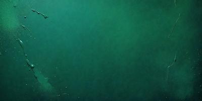 The primary subject of the image is a large body of water, which appears to be a deep blue color. The setting is underwater, with the water being the primary background. The visual style of the image is a photo, capturing the depth and beauty of the underwater environment. The colors and mood of the image are serene and calming, with the deep blue water creating a sense of tranquility and peacefulness.