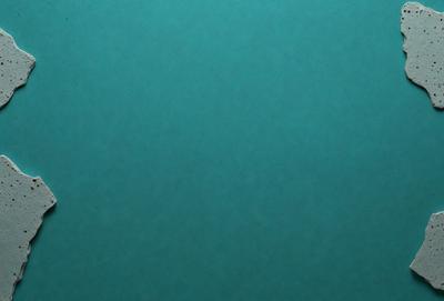The primary subject of the image is a large, dark blue surface. The setting appears to be a deep, dark ocean, with a vast expanse of water. The visual style of the image is a close-up of the ocean, showcasing the vastness and depth of the water. The colors and mood of the image are predominantly dark and moody, with the deep blue of the ocean creating a sense of depth and mystery.