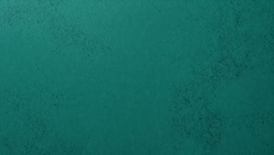 The primary subject of the image is a large, dark blue wall. The setting is a room with a greenish-blue color, which creates a calm and soothing atmosphere. The visual style is a close-up of the wall, showcasing its texture and color. The colors and mood of the image are predominantly dark blue and greenish-blue, giving it a serene and tranquil appearance.