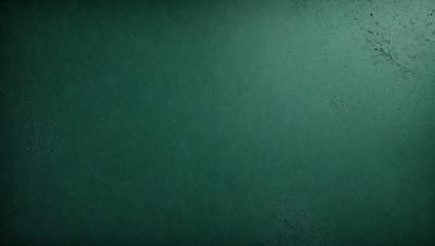 The primary subject of the image is a green background. The setting is a dark green surface, possibly a wall or a piece of fabric. The visual style is a close-up of the green background, which gives the image a simple and minimalistic appearance. The colors and mood of the image are predominantly green, creating a calm and serene atmosphere.