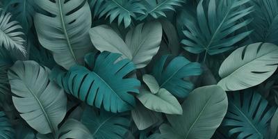 The primary subject of the image is a large group of green leaves, which are the main objects in the scene. The leaves are arranged in a dense, leafy pattern, creating a lush and vibrant atmosphere. The setting is a leafy plant, with the leaves covering most of the visible surface. The visual style of the image is a close-up of the leaves, showcasing their intricate details and textures. The dominant colors in the image are green, which is the color of the leaves, and blue, which
