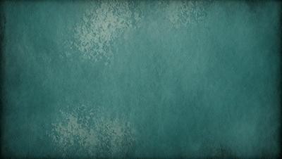 The primary subject of the image is a large, blue wall with a textured surface. The setting is a room with a blue-green color scheme. The visual style is a close-up of the wall, showcasing its unique texture. The colors and mood of the image are predominantly blue and green, creating a calm and serene atmosphere.