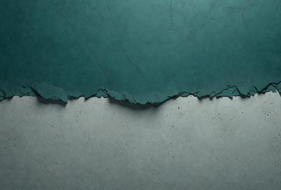 The primary subject of the image is a close-up of a blue wall with a crack in it. The setting is a room with a blue wall, and the visual style is a photo. The dominant colors are blue and grey, creating a calm and soothing atmosphere.