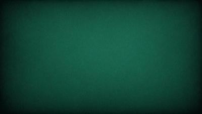 The primary subject of the image is a green background. The setting is a large, unoccupied space with a green surface. The visual style is a close-up of the green background, which gives the image a clean and simple appearance. The colors and mood are predominantly green, creating a calm and serene atmosphere.