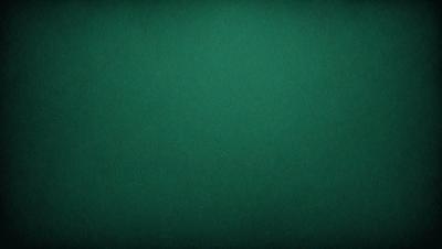 The primary subject of the image is a green background, which is the main object, scene, or focus of the image. The setting/background is a green cloth, and the visual style is a photo. The colors and mood of the image are predominantly green, creating a calm and serene atmosphere.