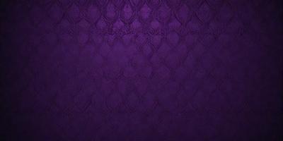 Purple fabric with a pattern of hearts.